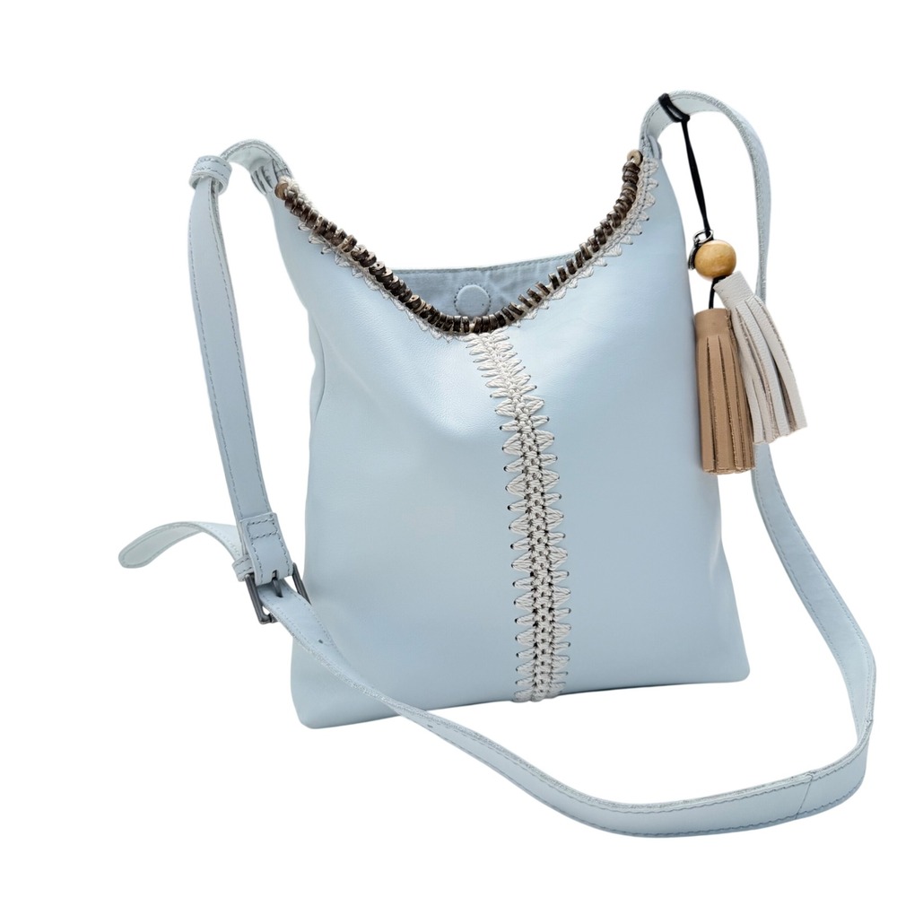 The Sak Huntley Chambray Blue Pebbled Leather Hobo Crossbody Bag Tassel Boho